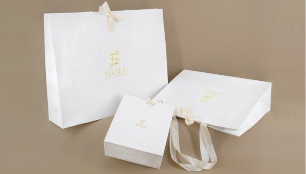 Rissmann creates luxury boxes a bags made of leather-like paper for Sholo