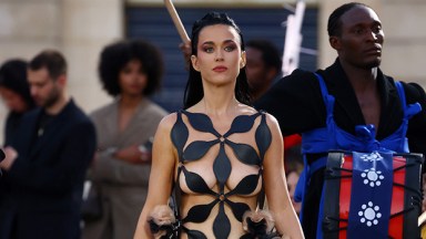 Katy Perry Stuns in Black Dress With Revealing Cutouts at Vogue World: Paris Show: Photos