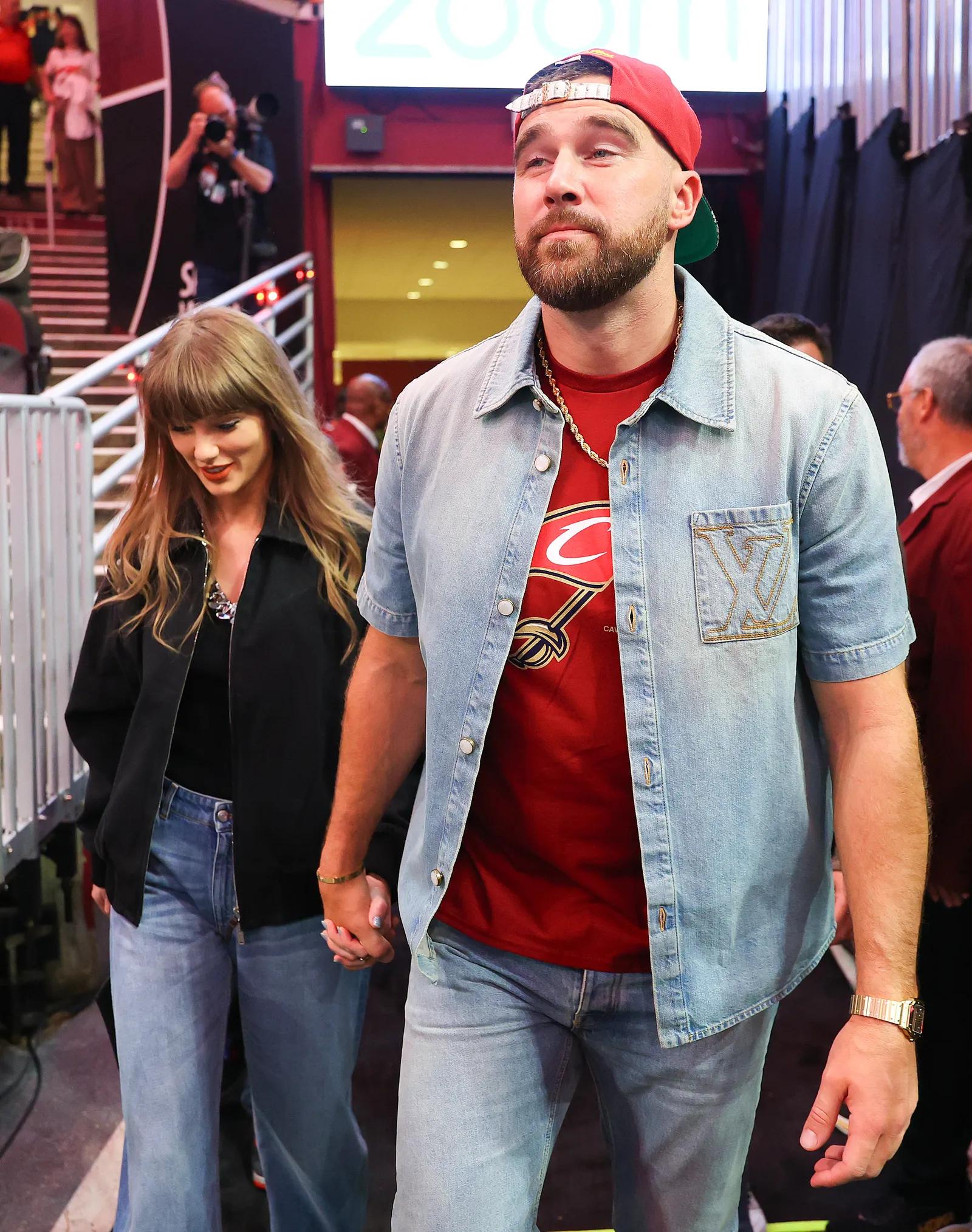 A Symphony of Style: Swift and Kelce Take Notes from Jenner and Chalamet's Courtside Panache 10