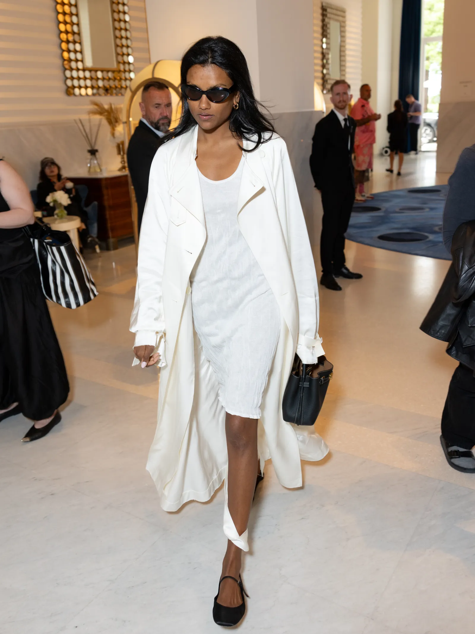 Chic Riviera Rendezvous: A Look at Star-Studded Street Style Moments 79