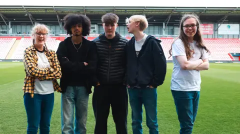 Echoes of Adolescence: Lottery Winners Harmonize with Youthful Odes to Leigh 5