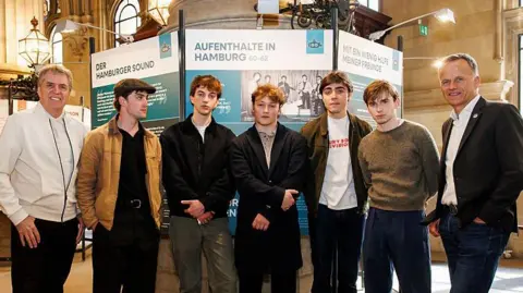 Hamburg's Echoes: Adolescent Stars Reimagine Beatlemania's Genesis 7