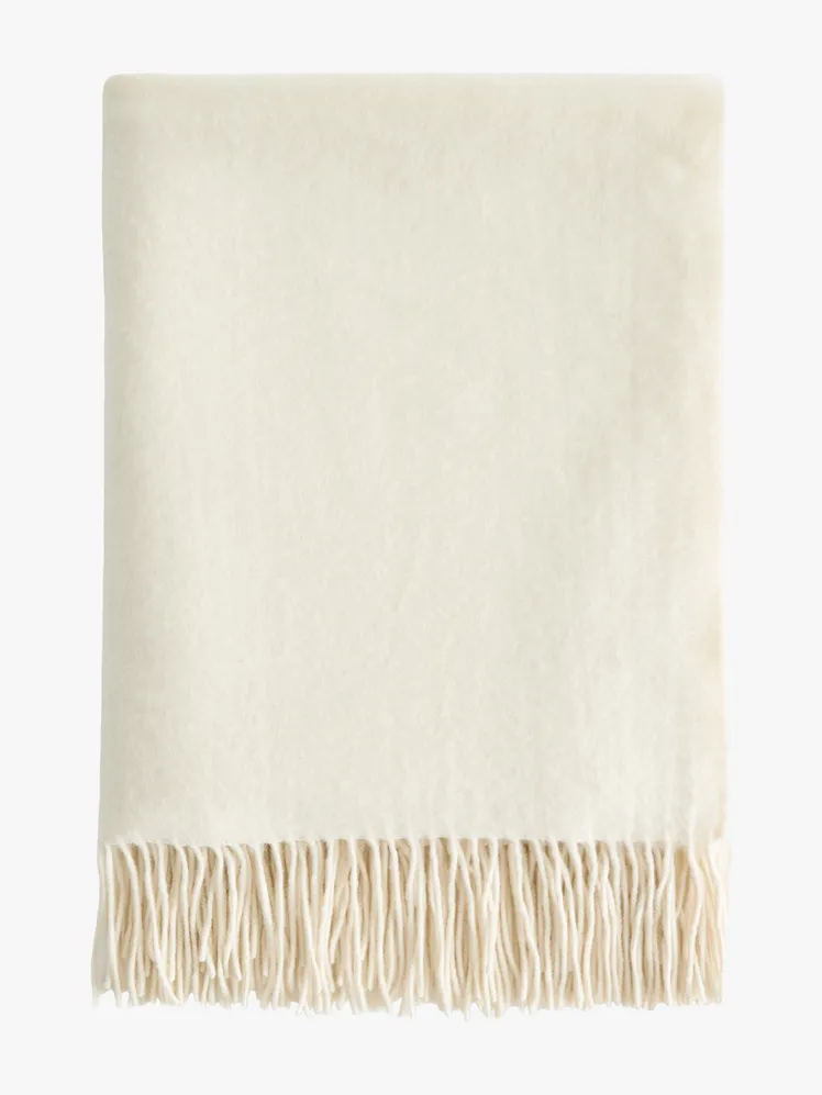 Whispers of Silk: Curated Comfort for the Discerning Abode 12