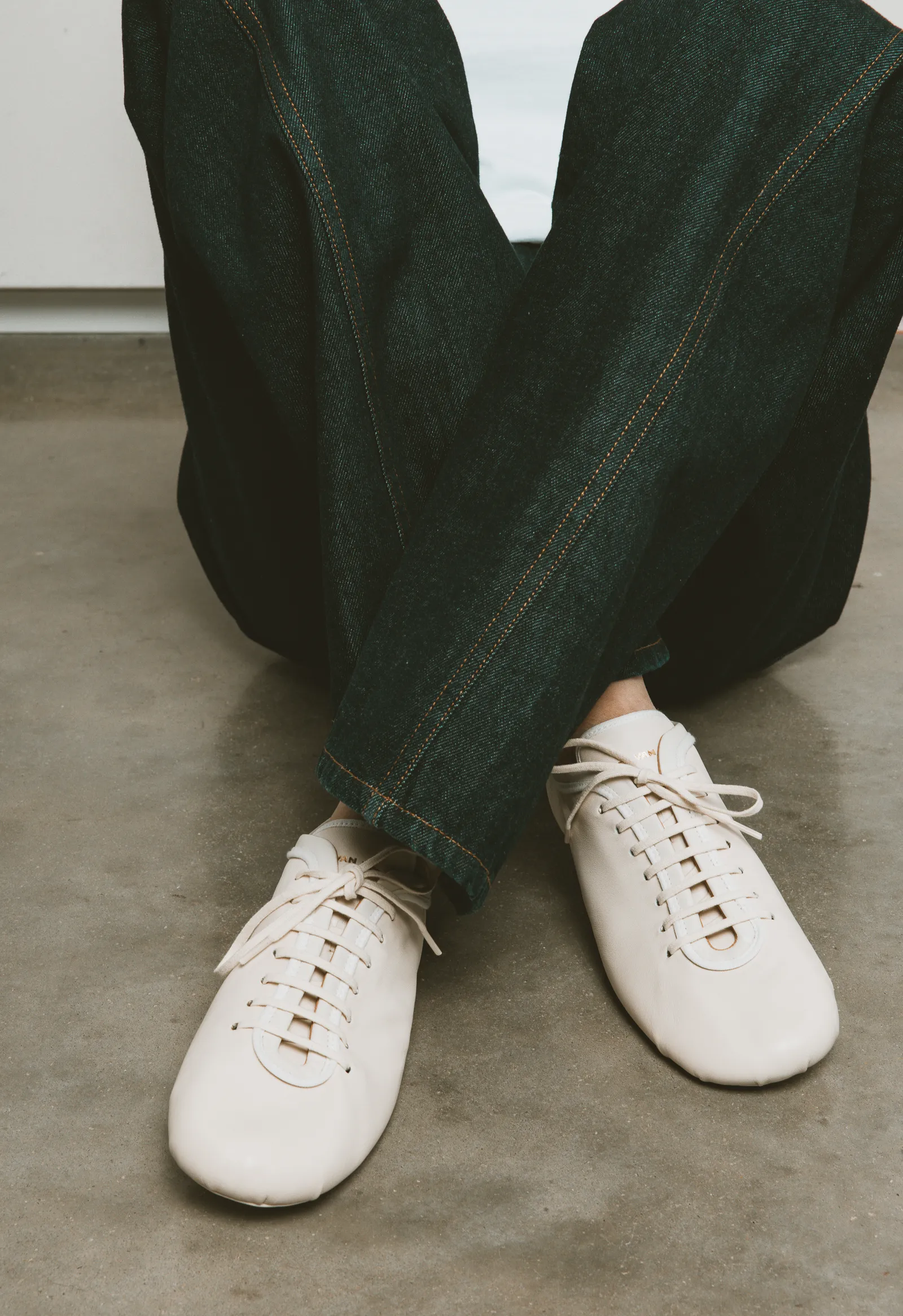 Chic Footwear: Vogue Editors Unveil Their Top White Sneaker Picks for 2026 74