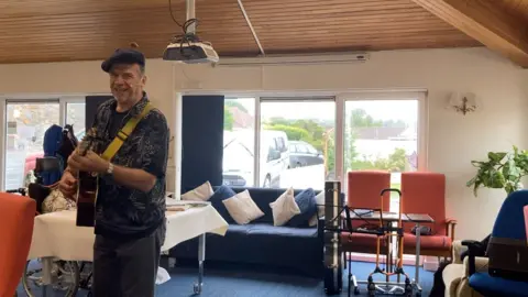 Island Melodies: Guernsey Musician Weaves Sonic Tapestry of Care Homes in Ambitious Two-Week Tour