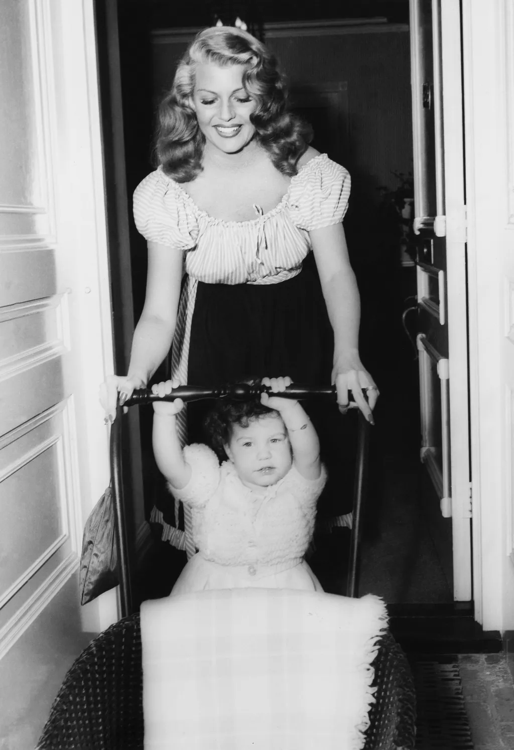 Golden Age Grace: Rita Hayworth's Private Elegance Unveiled 21