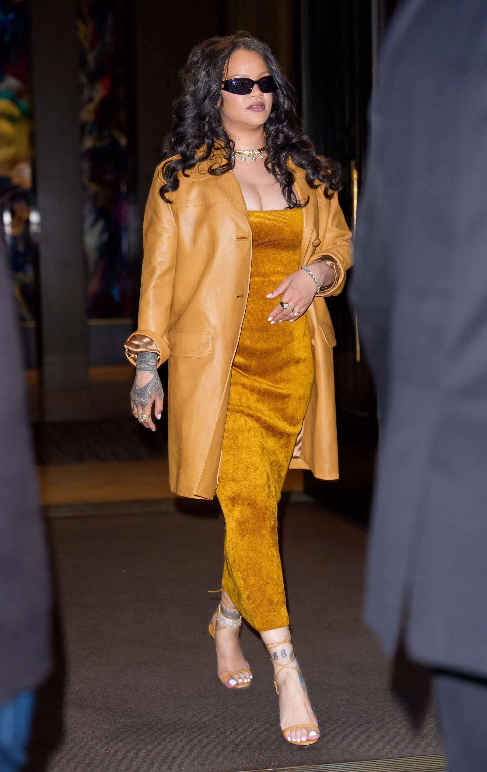 Rihanna and A$AP Rocky: A Court-Side Symphony of Style 6