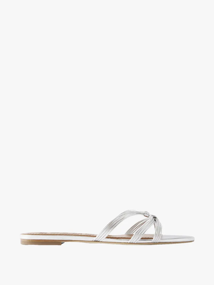 Ethereal Footwear for the Beach Wedding Connoisseur: From Chic Wedges to Playful Flats 35